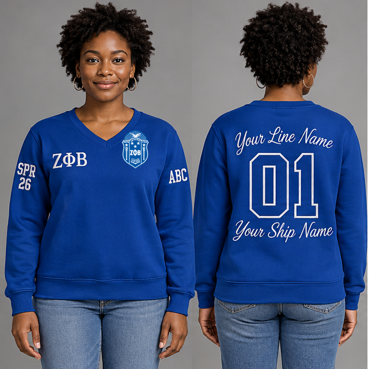 Zeta Phi Beta Royal Blue V-neck sweatshirt on an adult model with White Greek letters ΖΦΒ, original supplied crest, sample line name, number 01 and ship name, crossing year and chapter initials on sleeves.