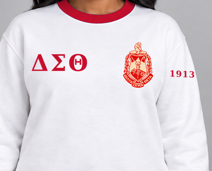 Delta Sigma Theta premium embroidered white solid contrast trim crewneck sweatshirt on model - chest embroidery close-up