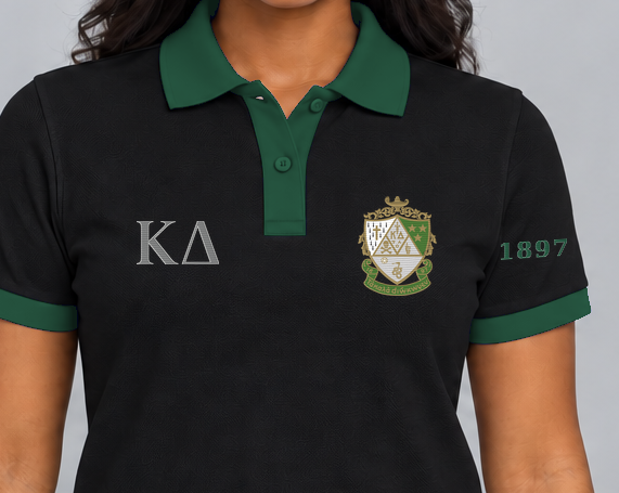 Kappa Delta premium embroidered black solid contrast trim polo on model - chest embroidery close-up