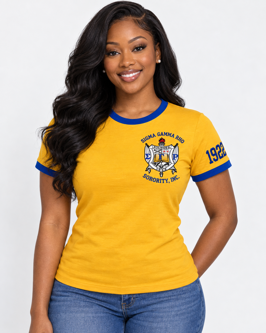 Model wearing a gold Sigma Gamma Rho ringer T-shirt with royal blue trim, chest crest and 1922 sleeve design
