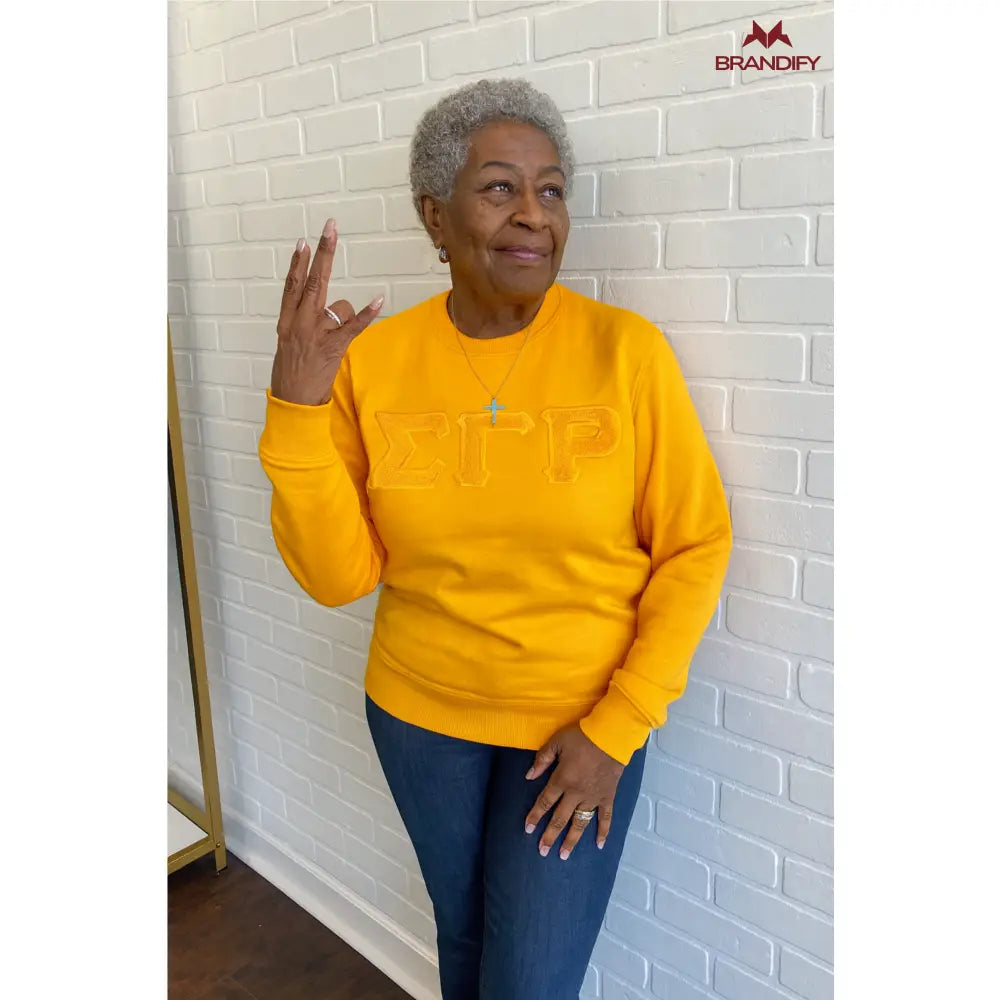Custom Sigma Gamma Rho Chenille Sweatshirt front view with personalized royal blue and gold design