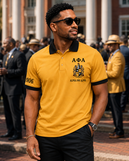 Lifestyle view of an Alpha Phi Alpha old gold and black embroidered polo
