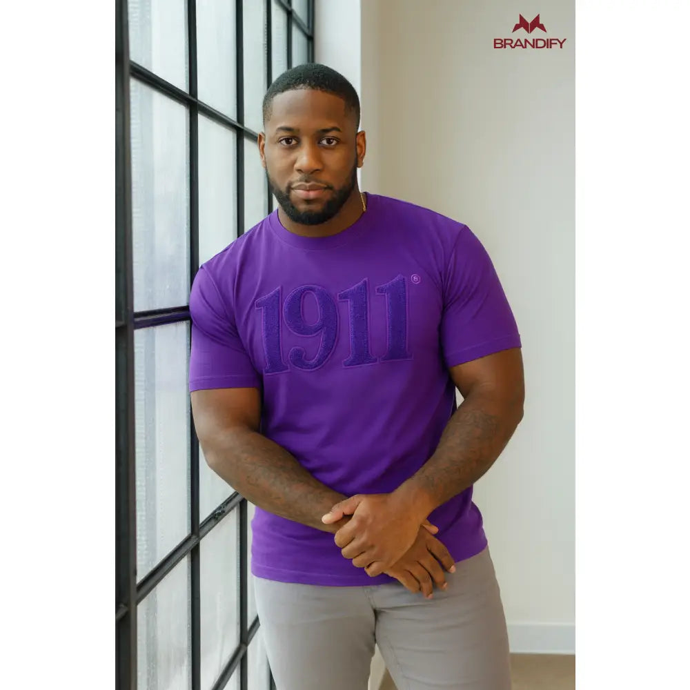 Custom Solid Color Omega Psi Phi Chenille Tee front view with raised chenille Greek lettering