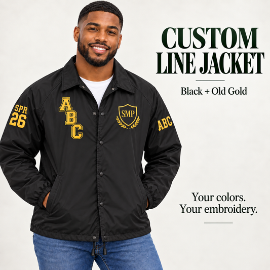 Black nylon snap-front line jacket with old gold sample embroidery on a male model