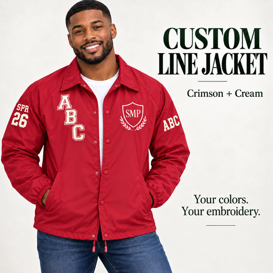 Crimson nylon snap-front line jacket with cream sample embroidery on a male model