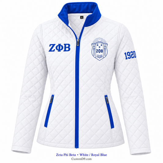 Zeta Phi Beta white and royal blue quilted jacket with crest, Greek letters, and 1920 sleeve embroidery