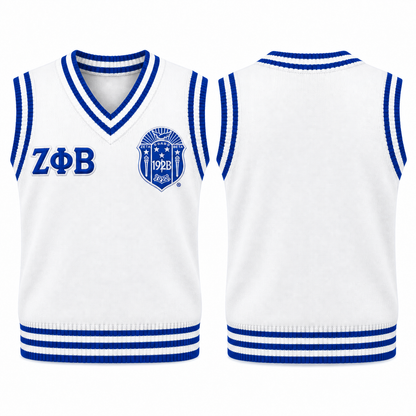 Zeta Phi Beta white and royal blue varsity sweater vest with crest and Greek letters, front and back views